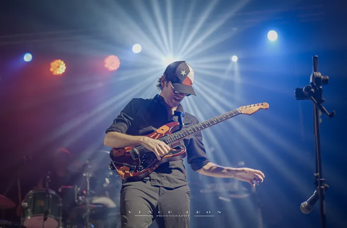 Guitarist reaching out during the show